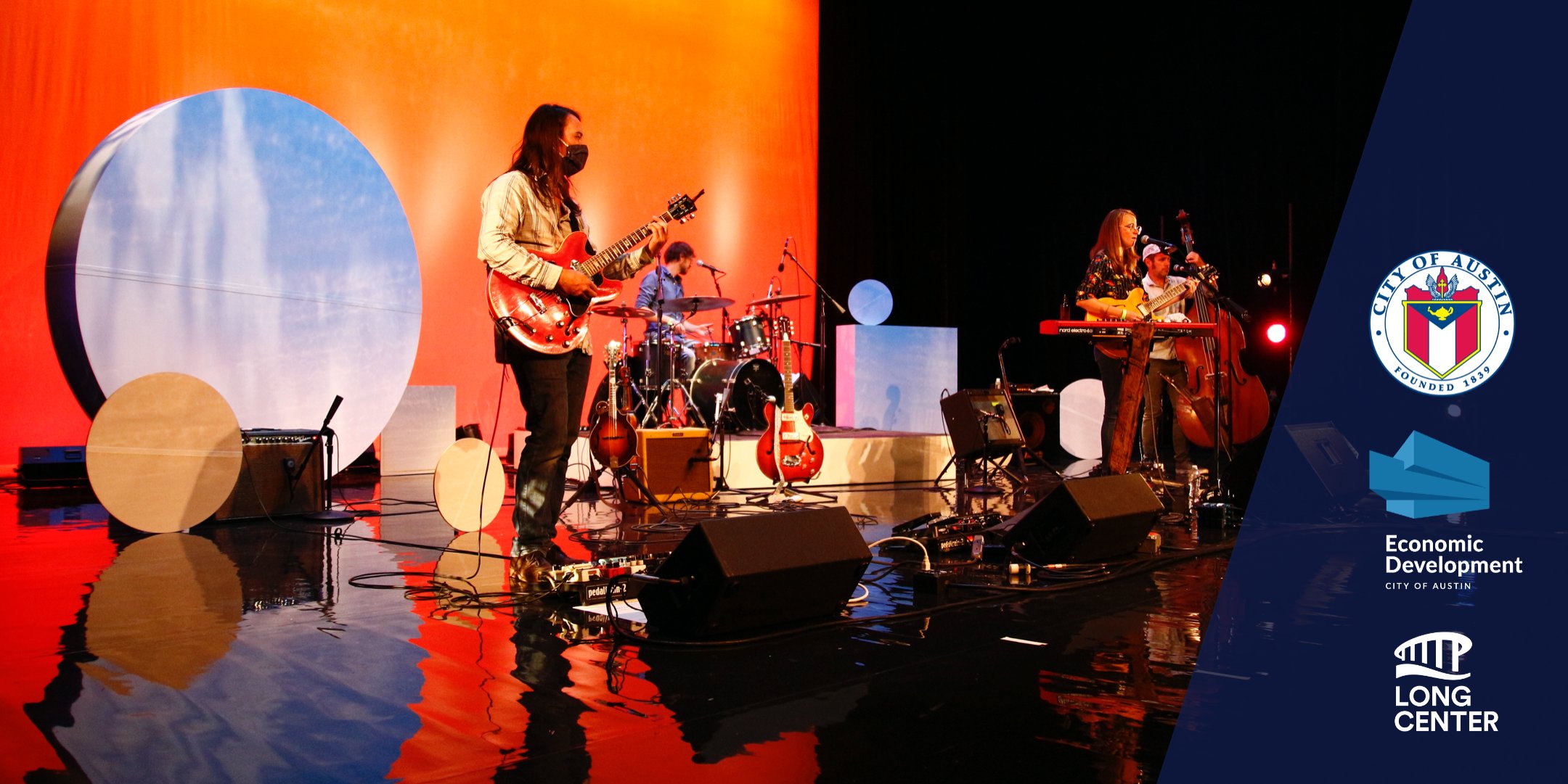 Local live music venue hosting a band playing instruments