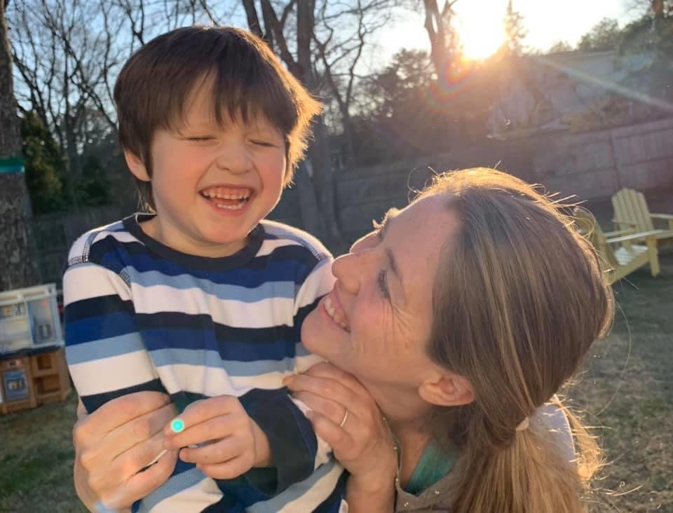 smiling mother and son