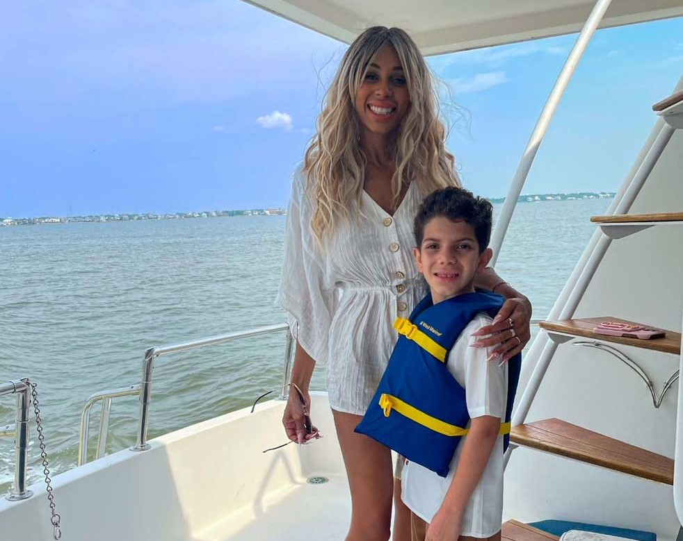 Imani and her son Jason on a boat