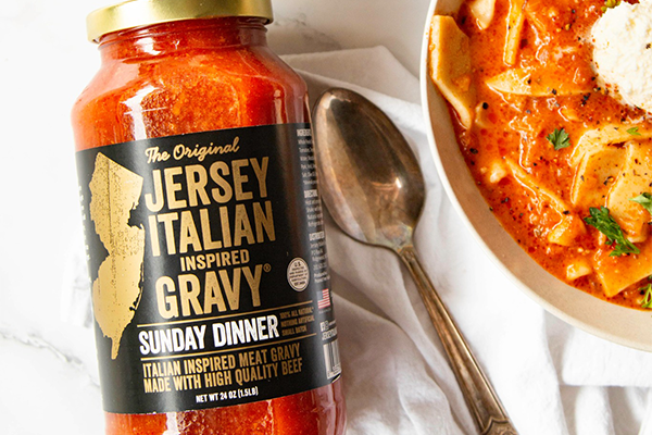 Jersey Italian Gravy jar next to a meal