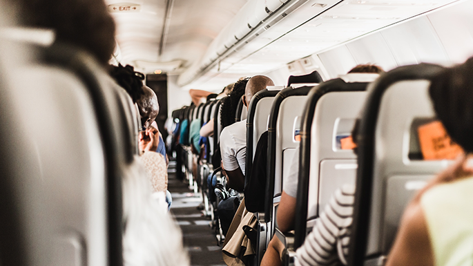 passengers traveling on an airplane