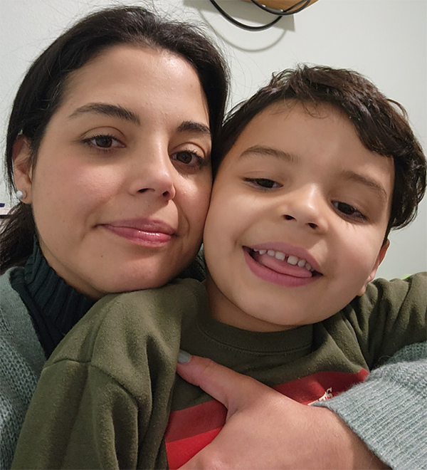 Stefania and Santiago smiling for a selfie