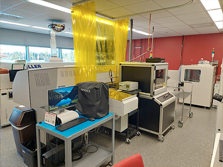 A lab setting with several machines.