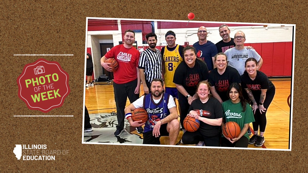 Glen Ellyn School District 41 staff pose for a post basketball game picture. 