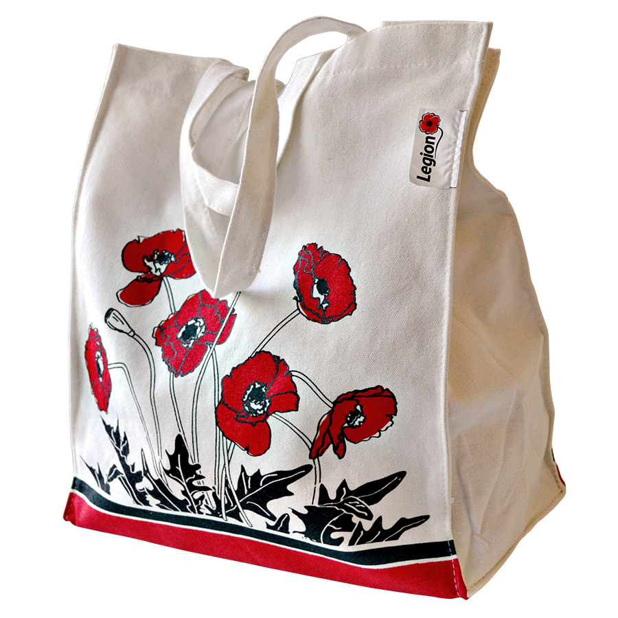 A white canvas shopping bag decorated with poppies in red, black and white.