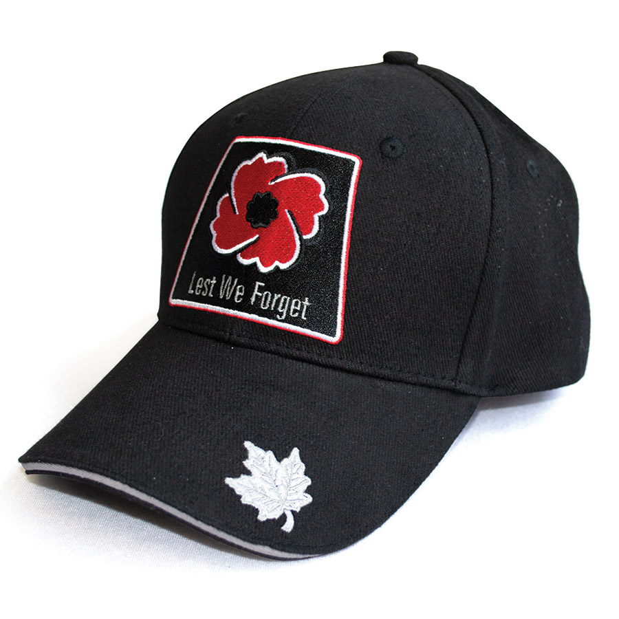 Black ball cap with a poppy and Lest We Forget on the front. A silver maple leaf is on the peak