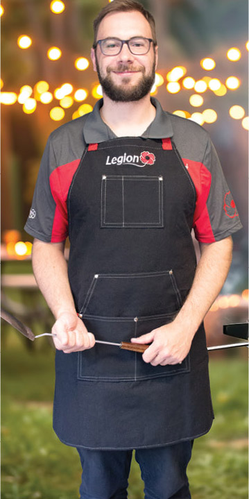 Barbecue apron in black with white stiching and a Legion logo across the top chest. Covers from chest to thighs.