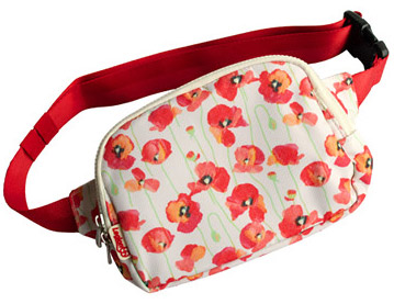 Crossbody pack with a poppy pattern on a cream background. Features an adjustable strap for a customized fit