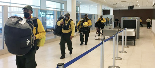 Mexican firefighters arrive in California to help battle wildfires