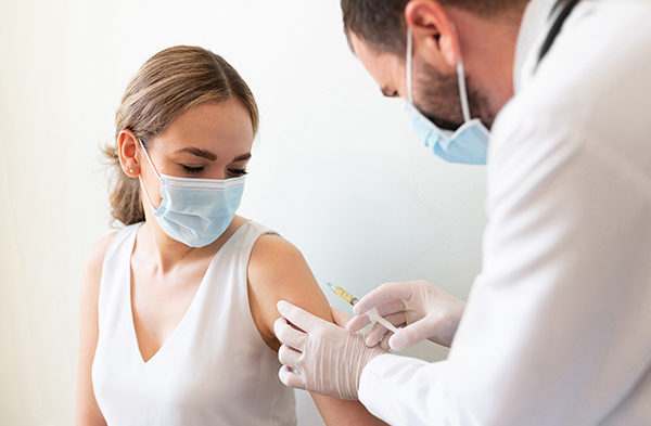 Woman getting vaccinated